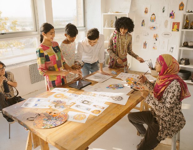 Students working together in a design and art studio